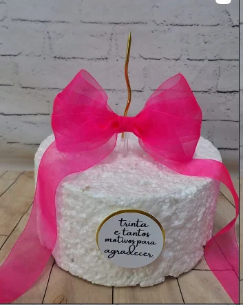 Peça personalizada com grande laço rosa